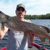 A Happy Angler With A Northern Pike At Hideaway Lodge